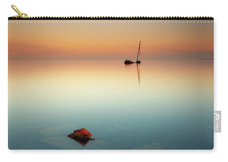 Shipwreck Zip Pouch featuring the photograph Flat calm shipwreck #1 by Grant Glendinning