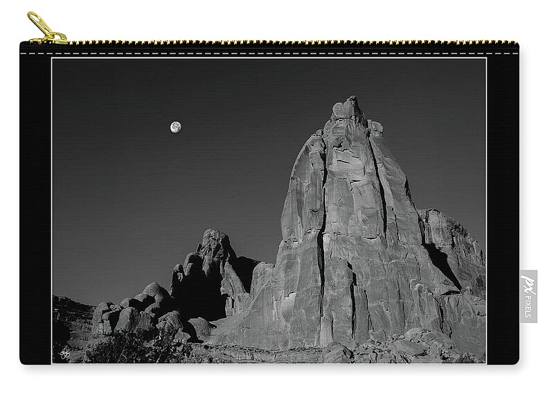 Moon Zip Pouch featuring the photograph Moon Over Arches Spire Monochrome #1 by Wayne King