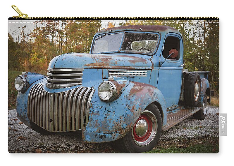 Old Chevy Zip Pouch featuring the photograph Old Chevy #1 by Michelle Wittensoldner