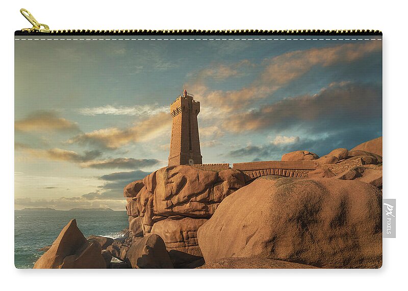 Coast Zip Pouch featuring the photograph Ploumanac'h lighthouse, Brittany by Stefano Orazzini