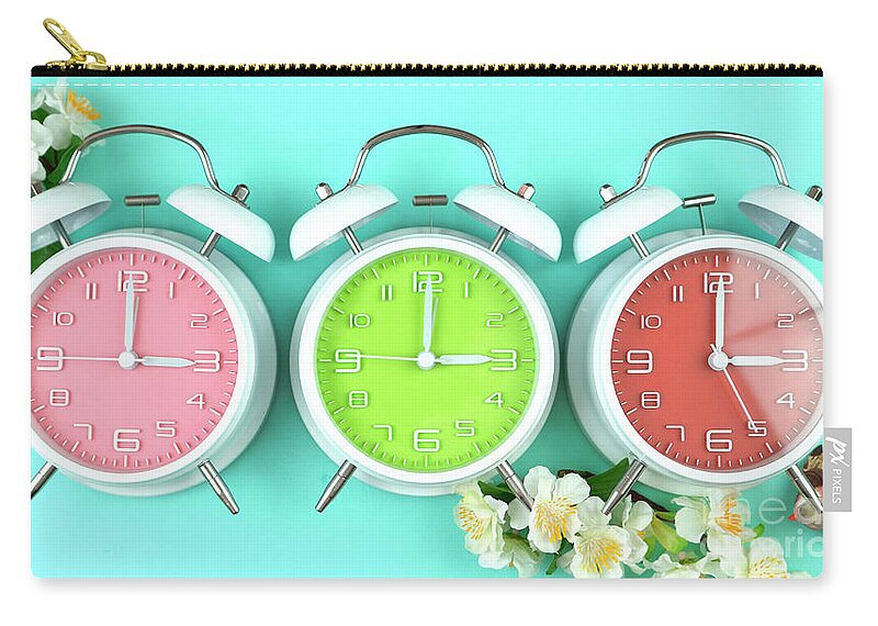 Alarm Zip Pouch featuring the photograph Springtime Daylight Saving Time Clocks #1 by Milleflore Images