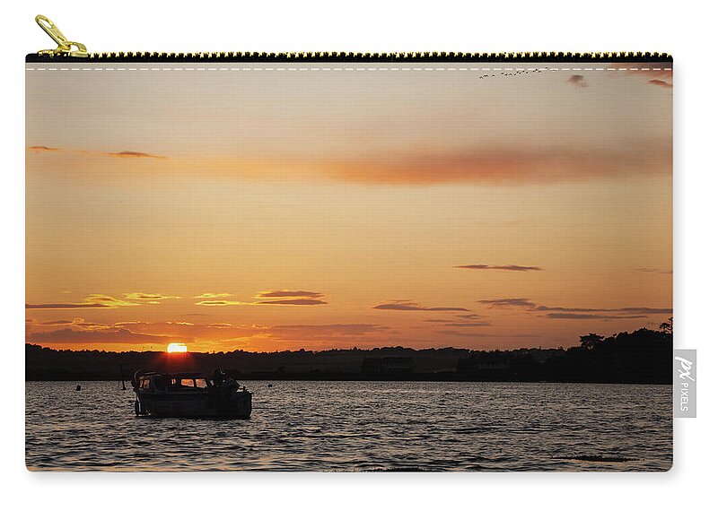 Sunset Zip Pouch featuring the photograph Sunset over Wexford Harbour, County Wexford, Republic of Ireland #1 by Ian Middleton