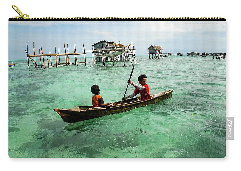 Sea Carry-all Pouch featuring the photograph Neptune's Children - Sea Gypsy Village, Sabah. Malaysian Borneo by Earth And Spirit