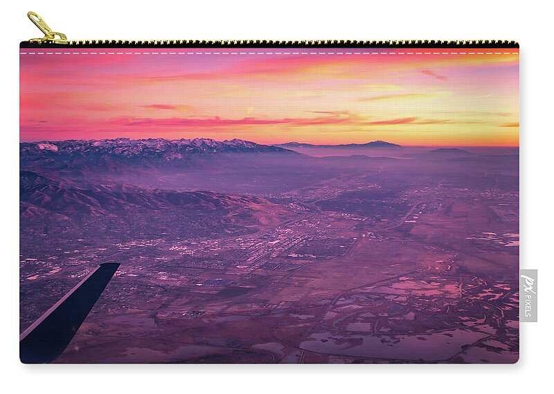 Flying Zip Pouch featuring the photograph Flying Over Rockies In Airplane From Salt Lake City At Sunset #13 by Alex Grichenko