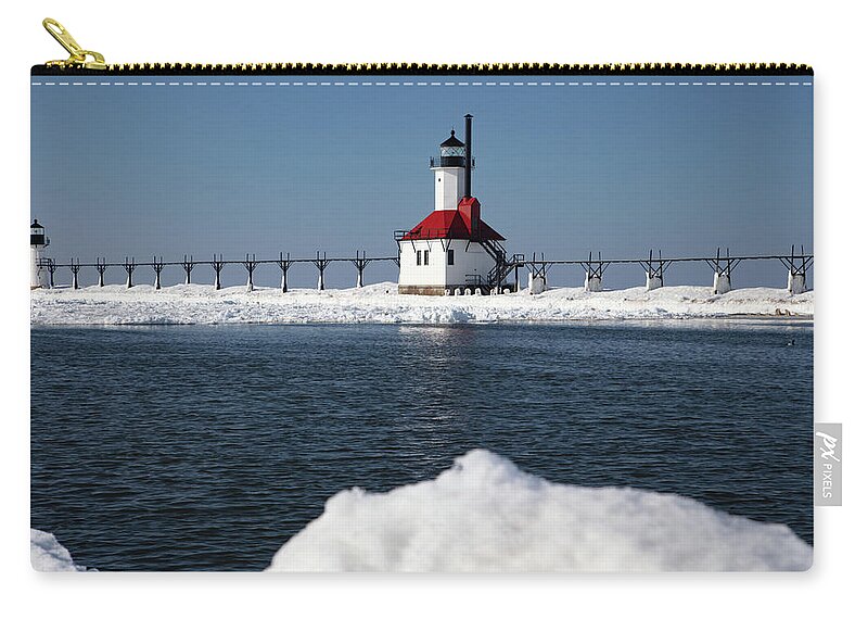 Lake Michigan Lighthouse Zip Pouch featuring the photograph St. Joseph Lighthouse in St. Joseph, Michigan along Lake Michigan in the winter #13 by Eldon McGraw