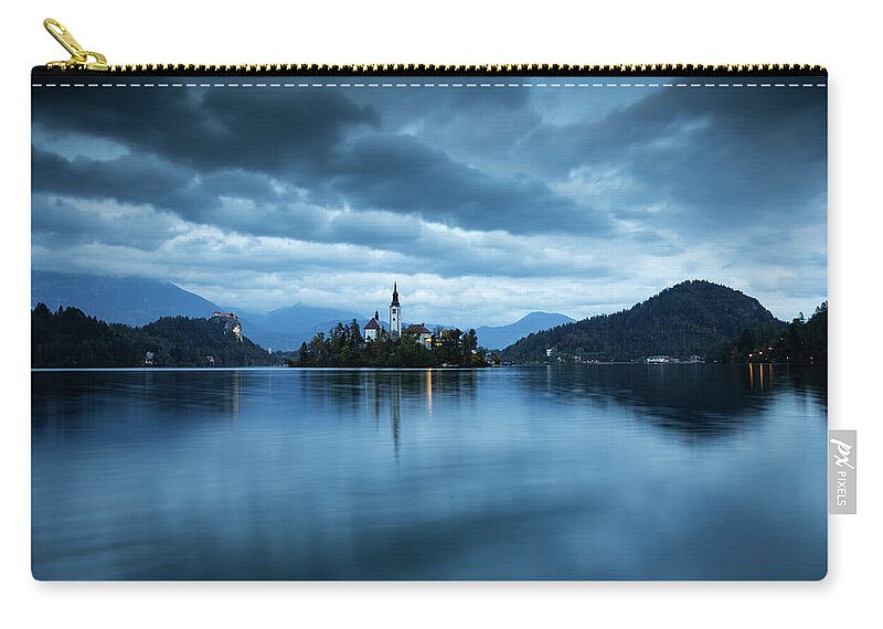 Bled Zip Pouch featuring the photograph Dusk over Lake Bled #14 by Ian Middleton