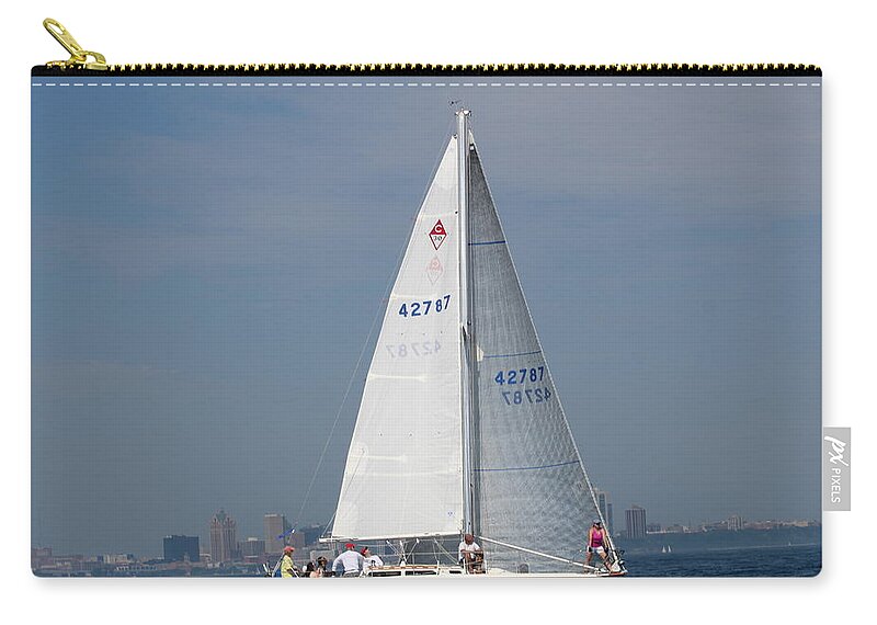  Zip Pouch featuring the photograph The race #15 by Jean Wolfrum