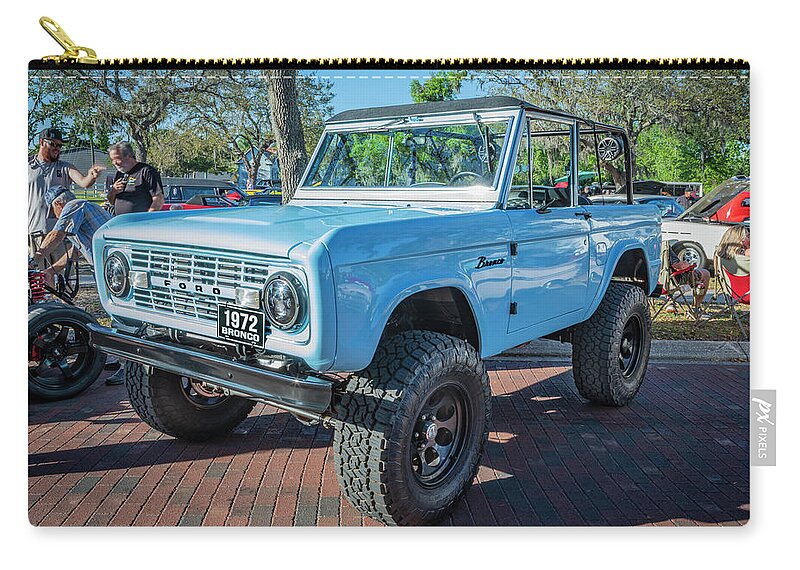 1972 Wind Blue Ford Bronco Zip Pouch featuring the photograph 1972 Wind Blue Ford Bronco X111 by Rich Franco
