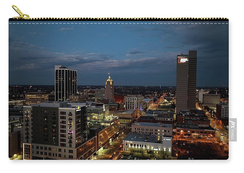 Fort Wayne Skyline Zip Pouch featuring the photograph Fort Wayne Indiana skyline at night by Eldon McGraw