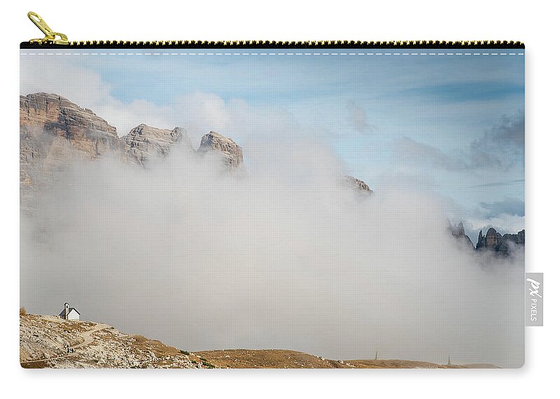 Tre Cime Zip Pouch featuring the photograph Mountain landscape with fog in autumn. Tre Cime dolomiti Italy. by Michalakis Ppalis