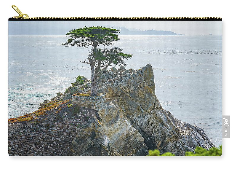 17 Mile Drive Zip Pouch featuring the photograph The Lone Cypress on a Rocky Coast. #2 by Hanna Tor
