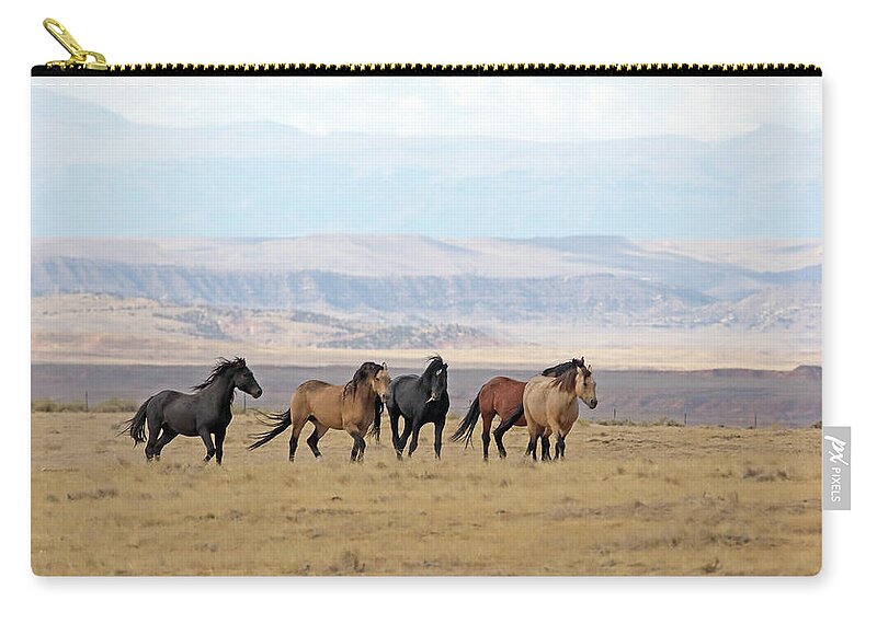 Mustangs Zip Pouch featuring the photograph 2021 McCullough Peaks Wild Horses by Jean Clark