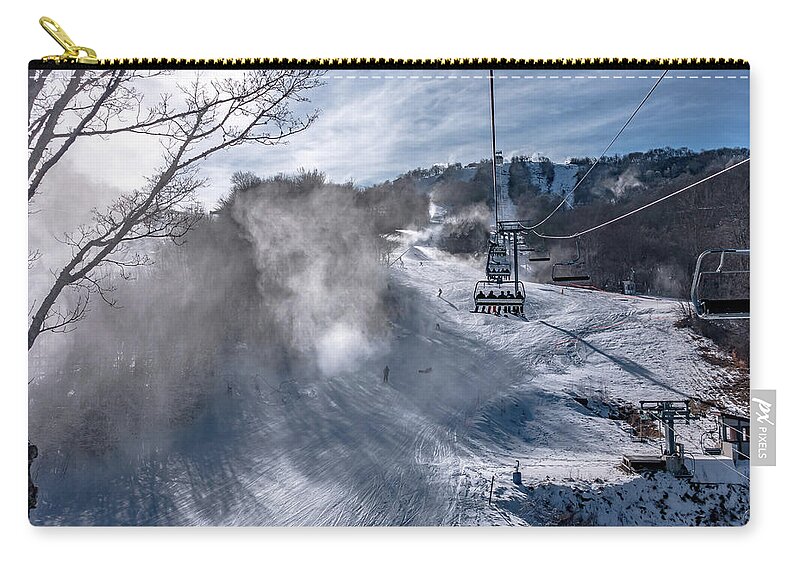 Sun Zip Pouch featuring the photograph Skiing At The North Carolina Skiing Resort In February #5 by Alex Grichenko