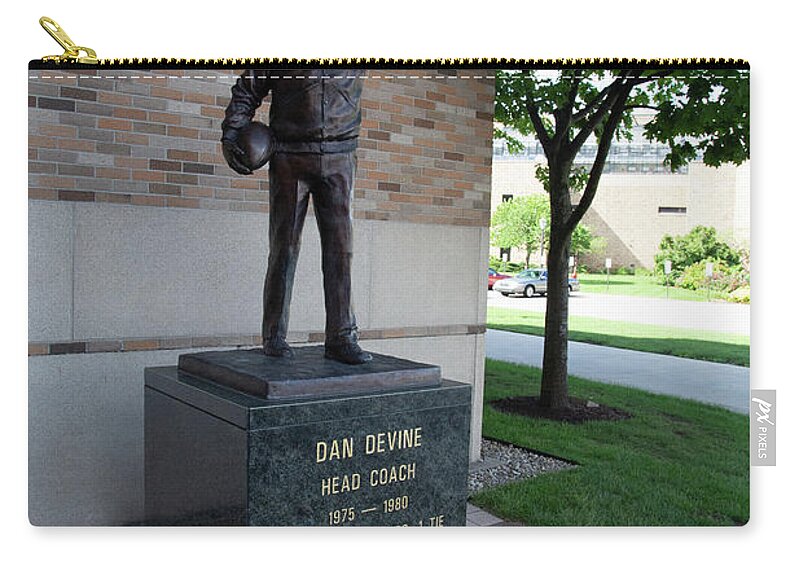Notre Dame Fighting Irish Zip Pouch featuring the photograph Coach Dan Devine statue at University of Notre Dame by Eldon McGraw