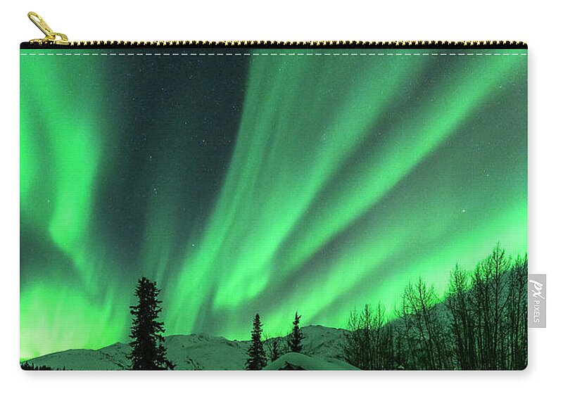 Aurora Zip Pouch featuring the photograph A Cabin in the Lights by Laura Hedien