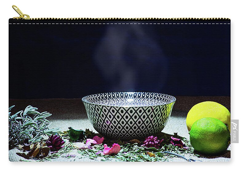 Tea Zip Pouch featuring the photograph A drinking bowl with tea and herbs. by Bernhard Schaffer