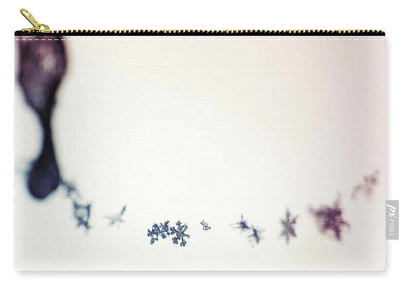 Abstract Zip Pouch featuring the photograph A natural Christmas decoration - snowflakes clinging to spider's thread by Ulrich Kunst And Bettina Scheidulin