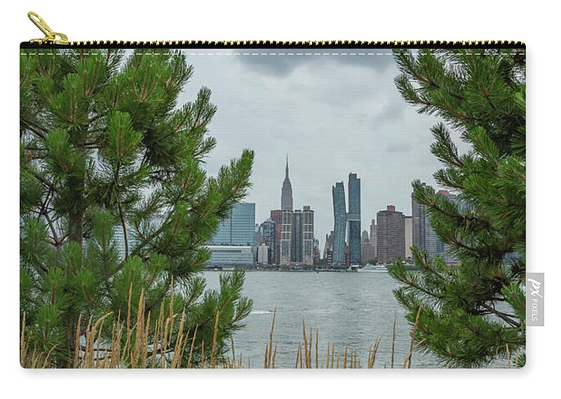 Hunter’s Point South Zip Pouch featuring the photograph A Peek through the Pines by Cate Franklyn