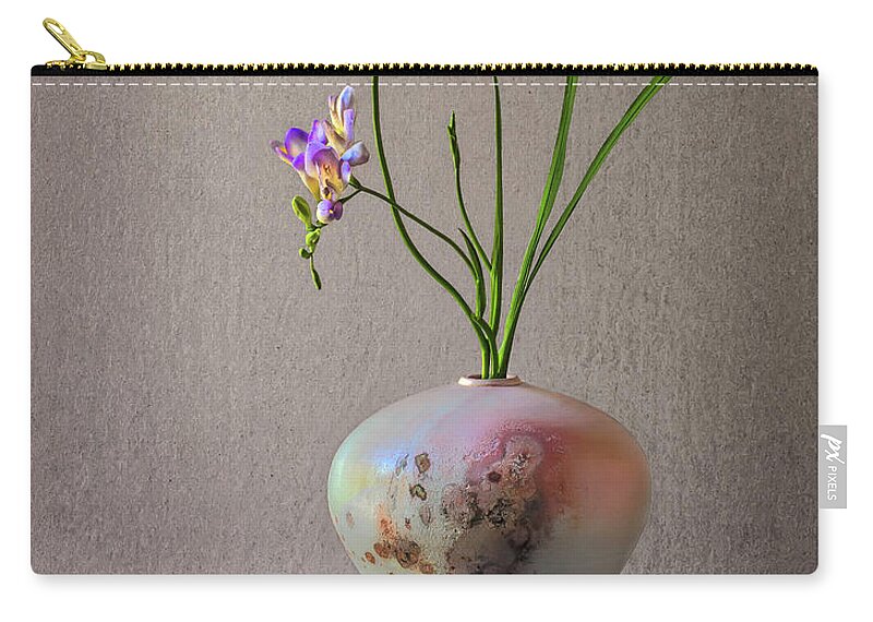 Freesia Zip Pouch featuring the photograph A Raku Vase With Freesias by Endre Balogh