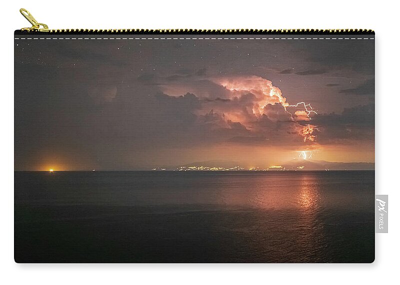 Lightning Zip Pouch featuring the photograph A Thunder Hitting The Ground by Alexios Ntounas