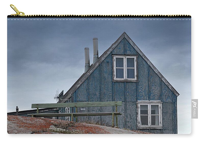 Greenland Zip Pouch featuring the photograph A wooden house in Disco bay by Anges Van der Logt