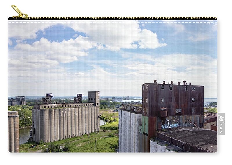 Abandoned Zip Pouch featuring the photograph Aerial view of grain silos by Karen Foley