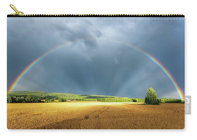 Rainbow Zip Pouch featuring the photograph Touched by the light by Rose-Marie Karlsen