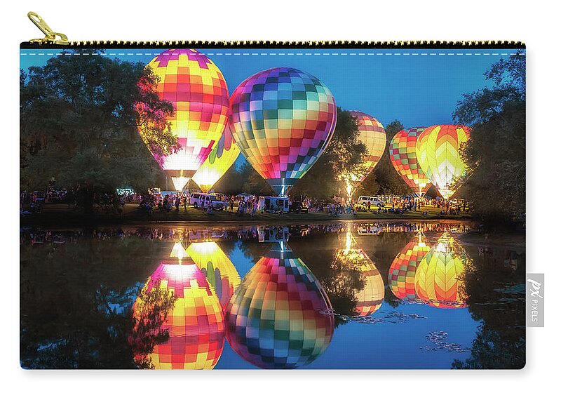 Hot Air Balloons Zip Pouch featuring the photograph All Balloon Glow - Centralia Balloon Fest by Susan Rissi Tregoning