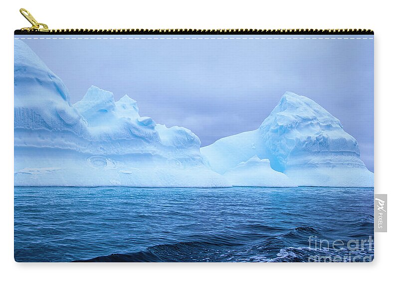 Antarctica Zip Pouch featuring the photograph Alone in the Antarctic by David Lichtneker