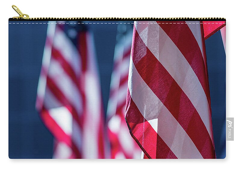 Flag Zip Pouch featuring the photograph American Flags 2 by Amelia Pearn