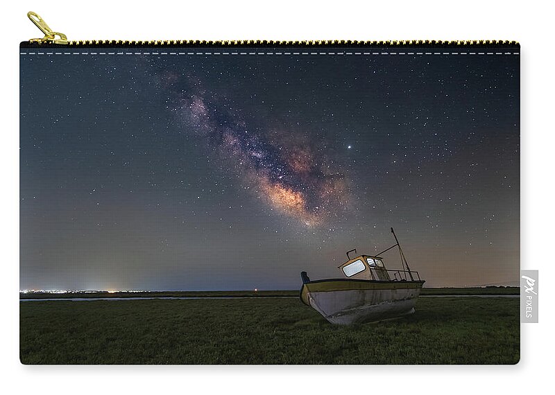 Milky Way Zip Pouch featuring the photograph An old boat under the milkyway by Alexios Ntounas