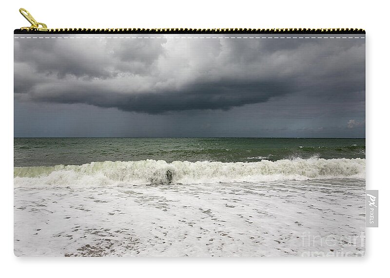 Sky Zip Pouch featuring the photograph Approaching storm by Bryan Attewell