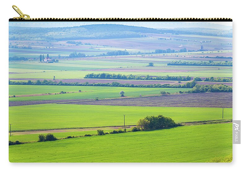 Arable Land Carry-all Pouch featuring the photograph Arable land in spring by Viktor Wallon-Hars