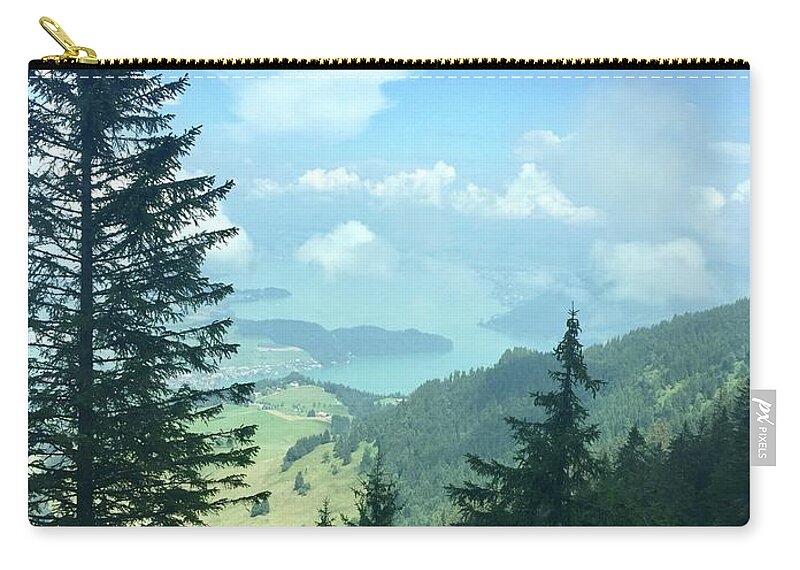 Arth Zip Pouch featuring the photograph Arth by Flavia Westerwelle