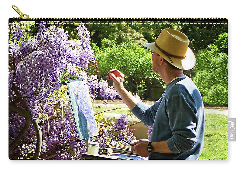 Color Zip Pouch featuring the photograph Artist with Canvas by Alan Hausenflock