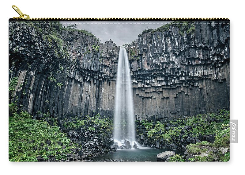 Iceland Zip Pouch featuring the photograph Svartifoss, the Black Fall, Iceland by Delphimages Photo Creations