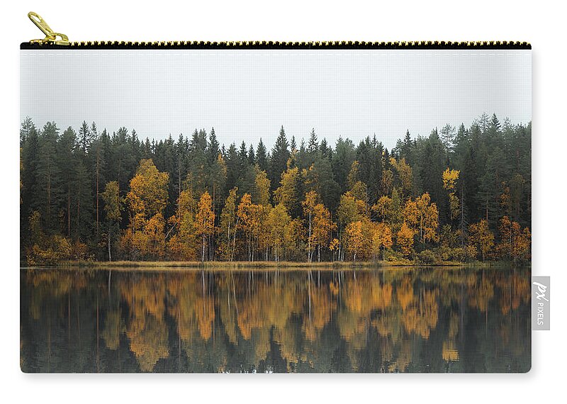 Dramatic Carry-all Pouch featuring the photograph Autumn fairy tale in Kainuu, Finland by Vaclav Sonnek