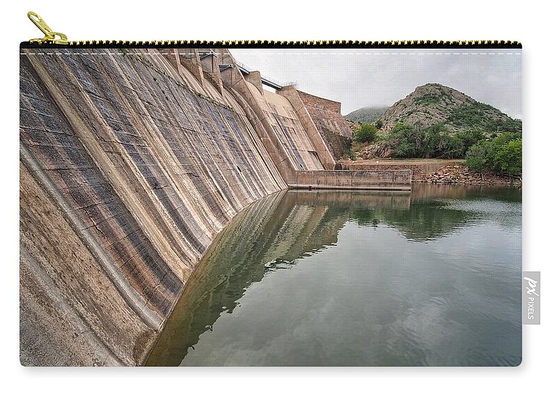 Back Of The Dam Zip Pouch featuring the photograph Back of the Dam by Buck Buchanan