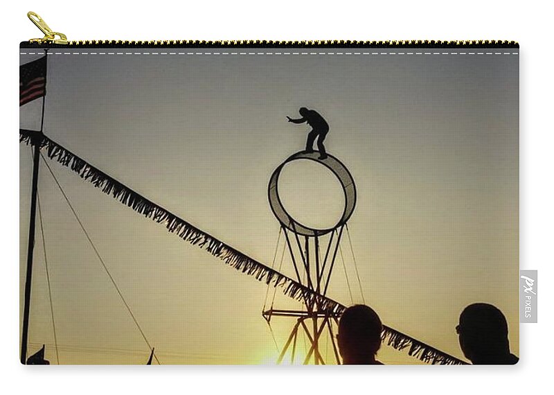 Carnival Carry-all Pouch featuring the photograph Balance in the sunset by Shalane Poole
