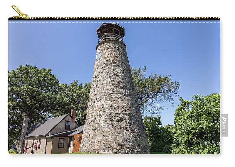 American Zip Pouch featuring the photograph Barcelona Lighthouse against blue skies by Karen Foley