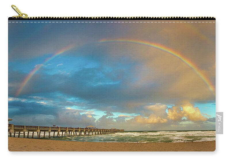 Atlantic Ocean Zip Pouch featuring the photograph Beautiful Rainbow Over Juno Beach Pier Florida by Kim Seng