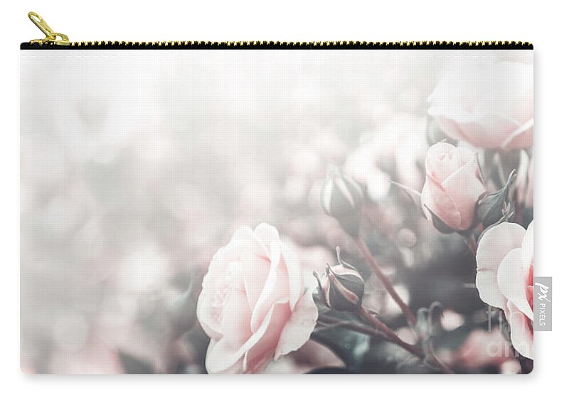 Roses Zip Pouch featuring the photograph Beautiful pastel roses in garden by Jelena Jovanovic