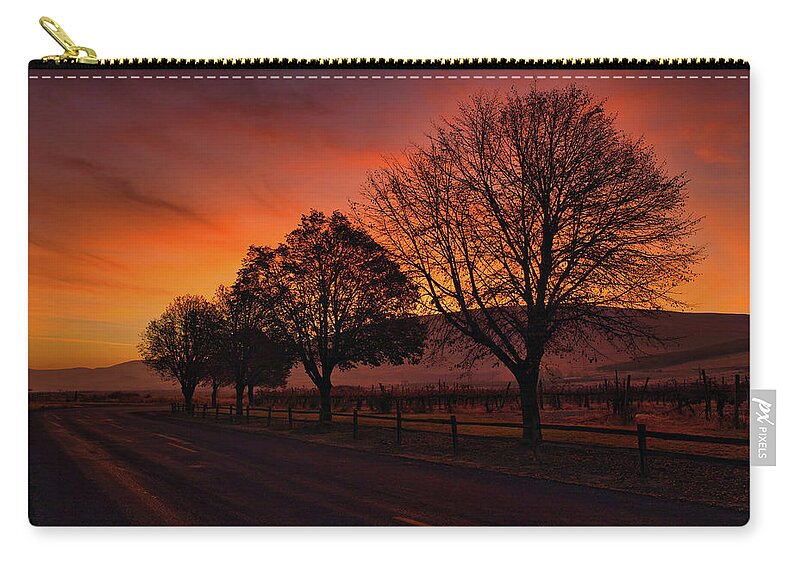 Beauty At Sunrise Zip Pouch featuring the photograph Beauty at Sunrise by Lynn Hopwood