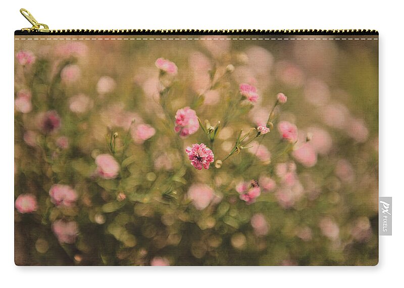  Carry-all Pouch featuring the photograph Beauty in the garden by Yasmina Baggili