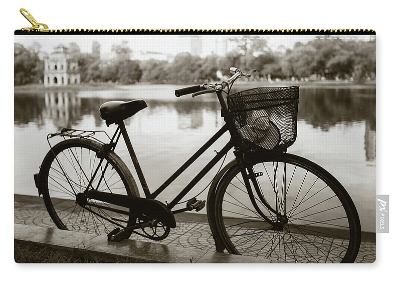 Bicycle Carry-all Pouch featuring the photograph Bicycle by Hoan Kiem Lake by Dave Bowman