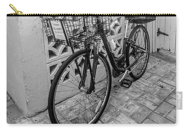 Worth Zip Pouch featuring the photograph Bicycle in the Courtyard Black and White by Debra and Dave Vanderlaan