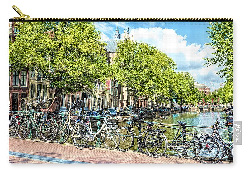 Amsterdam Zip Pouch featuring the photograph Bicycles Along the Canals by Debra and Dave Vanderlaan