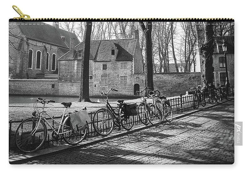 Bruges Zip Pouch featuring the photograph Bicycles of Bruges Belgium Black and White by Carol Japp