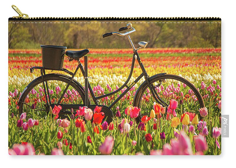 Tulip Zip Pouch featuring the photograph Biking Through The Tulips by Kristia Adams
