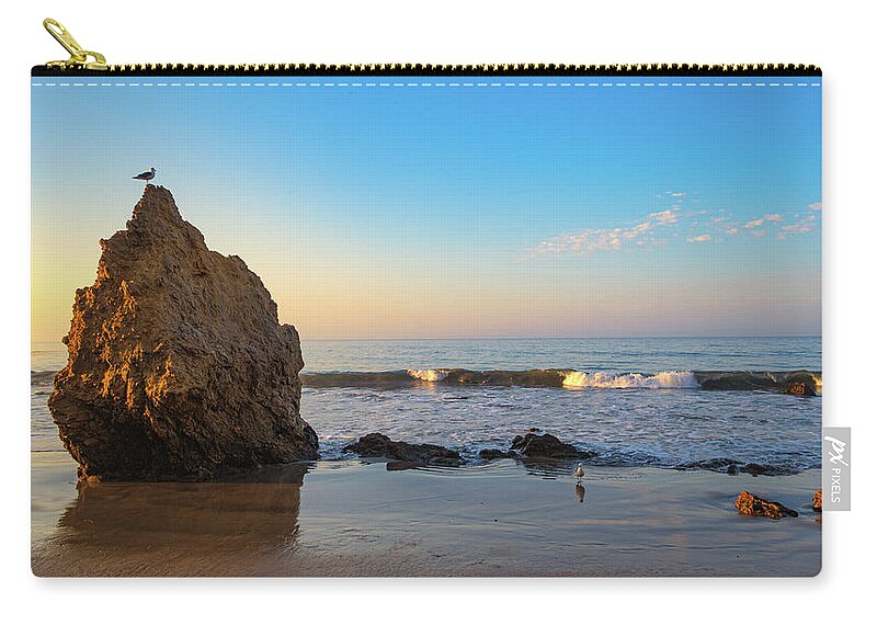 Beach Zip Pouch featuring the photograph Bird on a Rock after Sunrise by Matthew DeGrushe